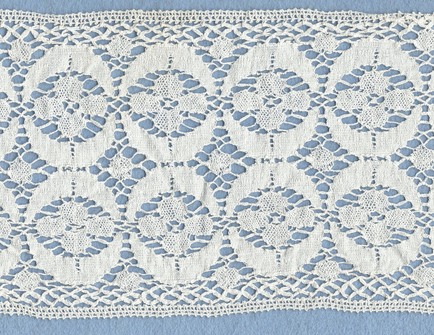 Machine lace insertion