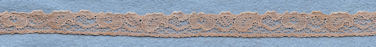 Flowery machine lace with gimp on one side