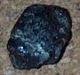 Chrysoberyl under artificial light