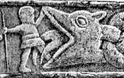 Vadir fighting the wolf on the Gosforth Cross, in Cumbria, UK
